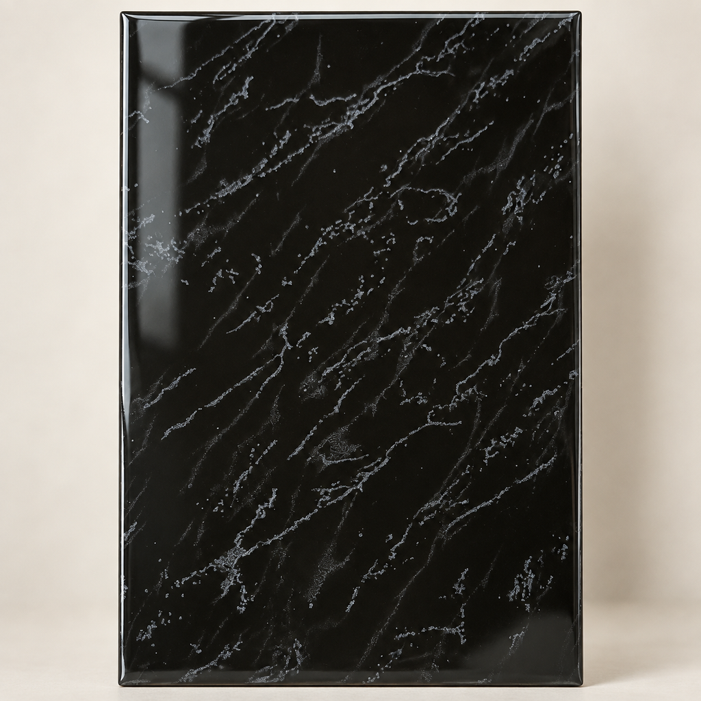 Detail of glossy black marble-look tile
