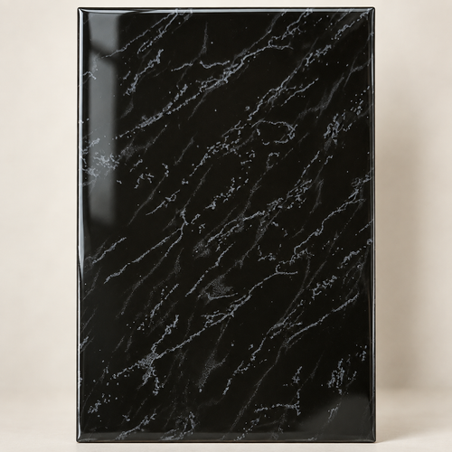 Detail of glossy black marble-look tile