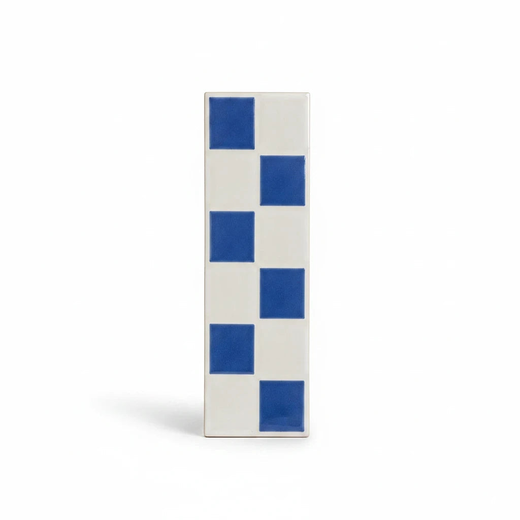 Retro Tile by Standard Tile blue and white checkerboard ceramic accent tile with a glossy finish